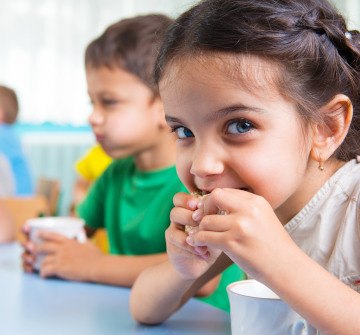 Closeup of child eating lunch at school