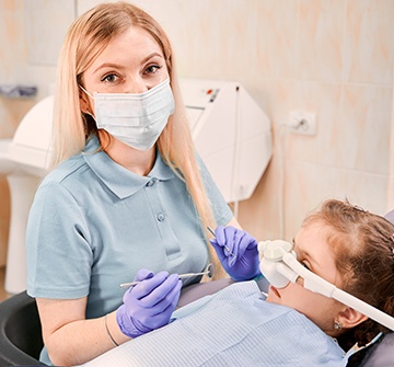 a patient being treated by a hygienist 